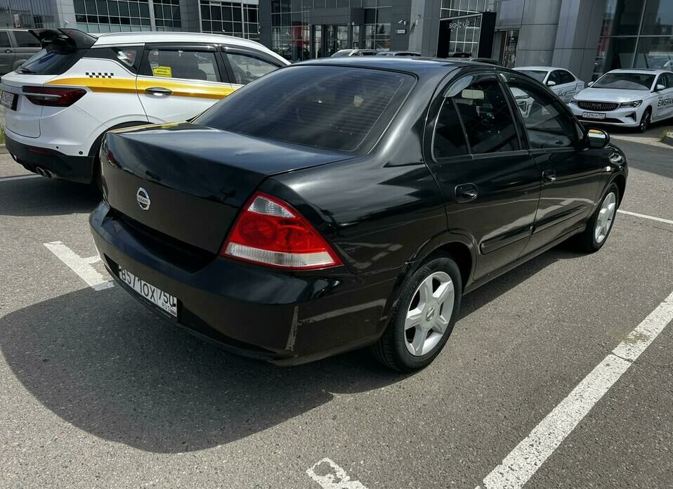 Nissan Almera Classic 1.6 AT (107 л.с.)