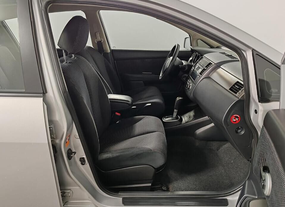 Nissan Tiida 1.6 AT (110 л.с.)