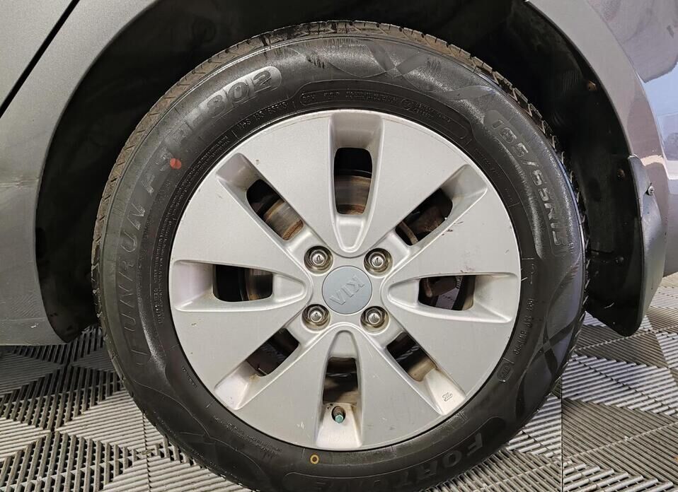 Kia Rio, III 4-speed 1.6 AT (123 л.с.)