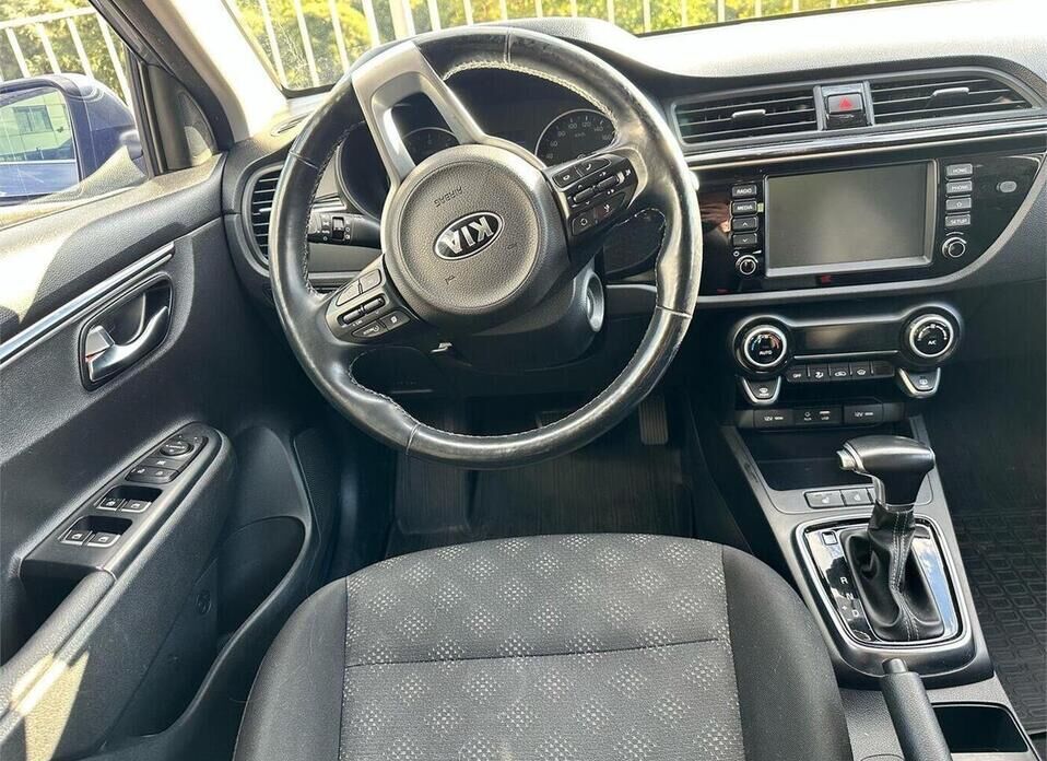 Kia Rio 1.6 AT (123 л.с.)