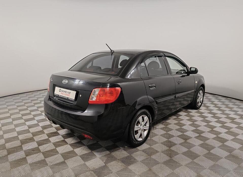 Kia Rio, II Рестайлинг 1.4 AT (95 л.с.)