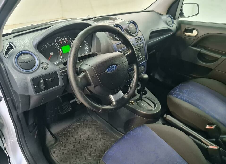 Ford Fiesta 1.6 AT (101 л.с.)