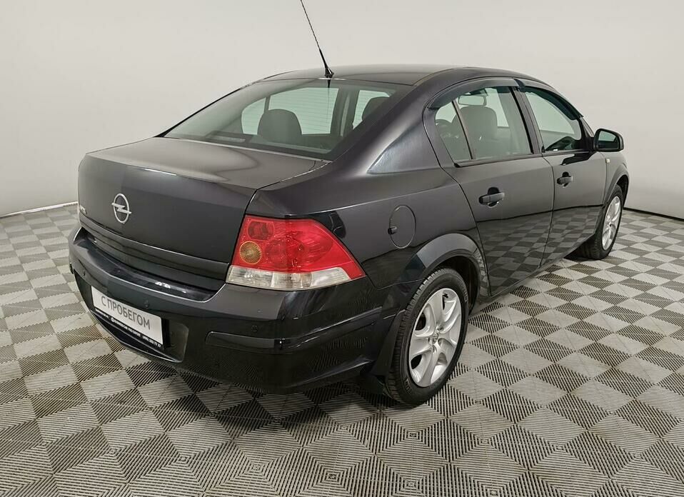 Opel Astra 1.8 AT (140 л.с.)
