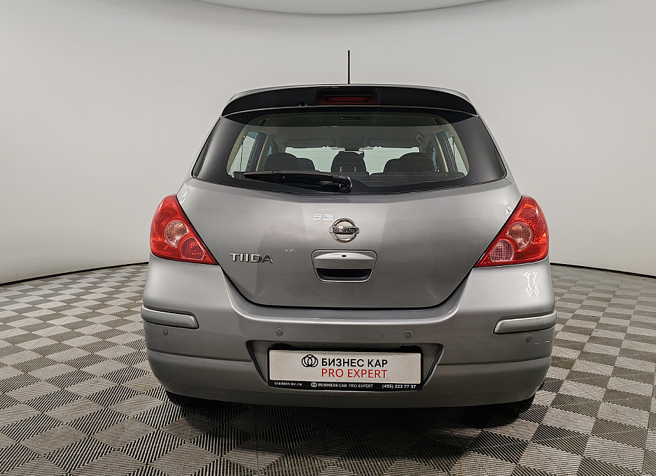 Nissan Tiida, I Рестайлинг 1.6 AT (110 л.с.)