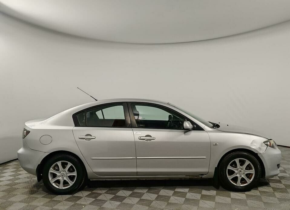 Mazda 3 1.6 AT (105 л.с.)