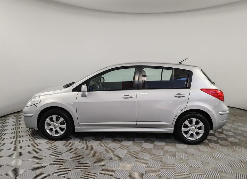Nissan Tiida 1.6 AT (110 л.с.)