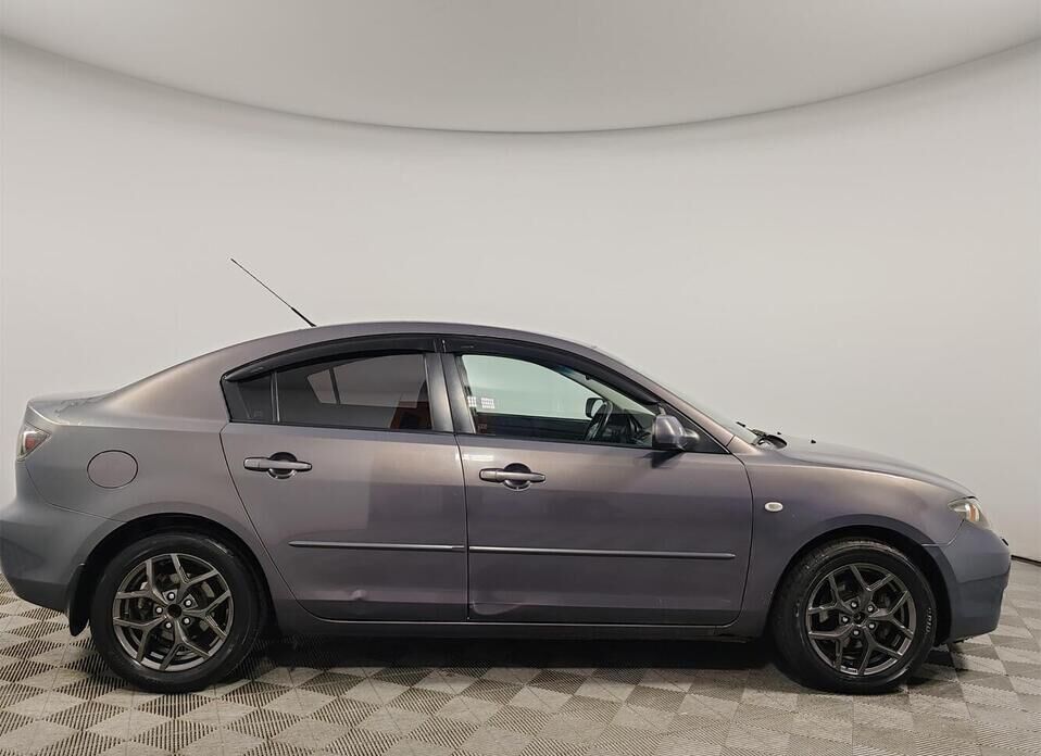 Mazda 3 1.6 AT (105 л.с.)