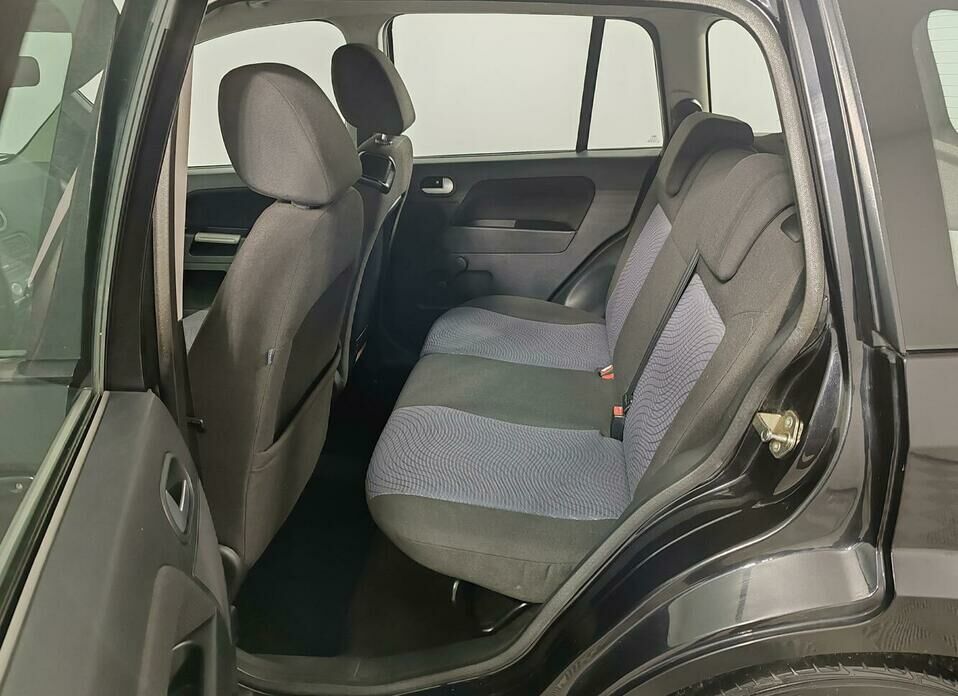 Ford Fusion 1.6 AT (101 л.с.)