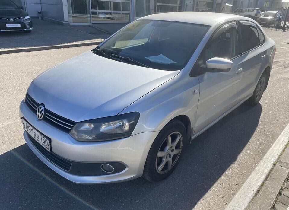 Volkswagen Polo 1.6 AT (105 л.с.)