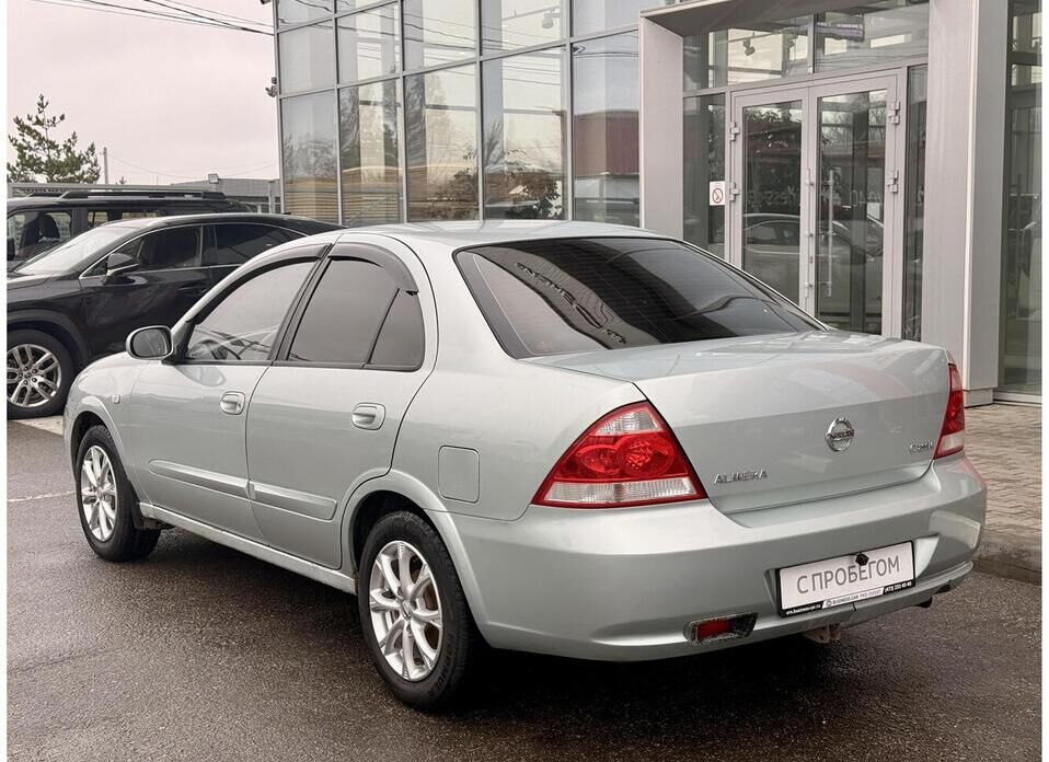 Nissan Almera Classic, I 1.6 MT (107 л.с.)