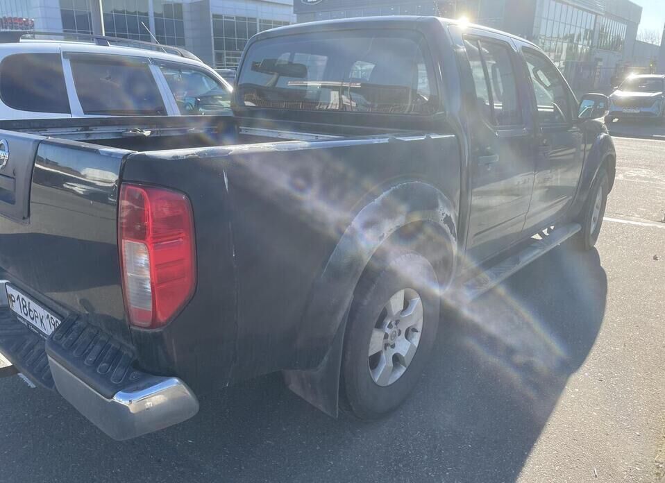 Nissan Navara (Frontier), III (D40) 2.5d AT (174 л.с.) 4WD