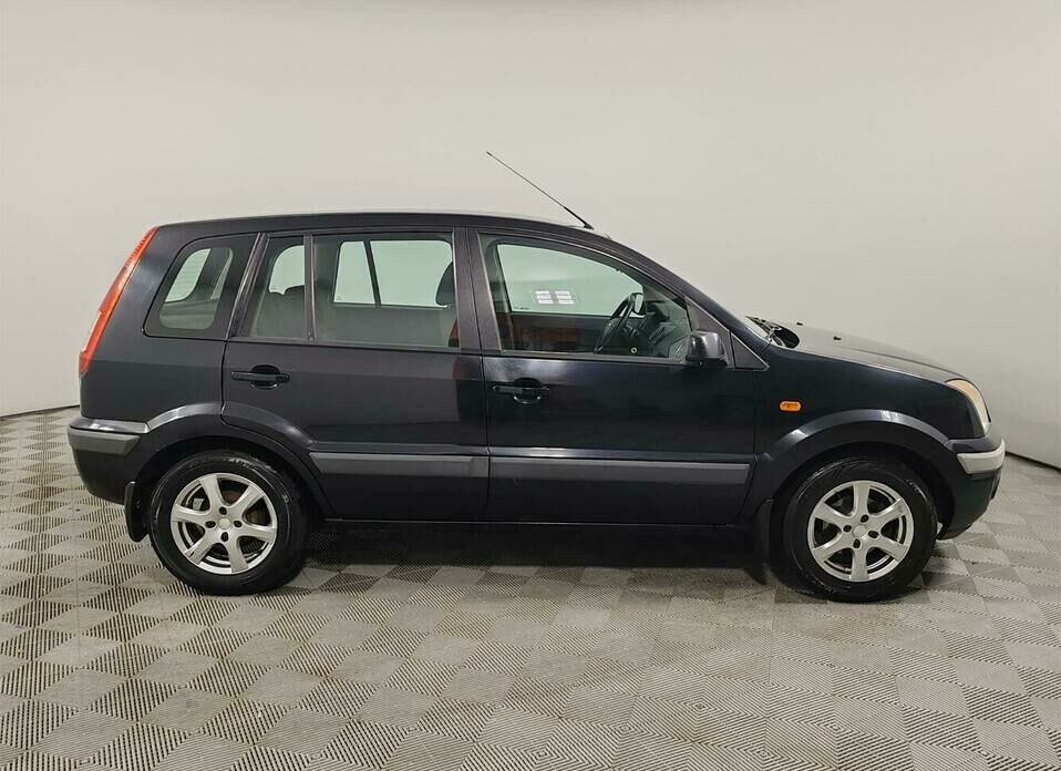 Ford Fusion 1.6 AT (101 л.с.)