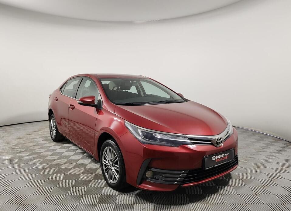 Toyota Corolla, XI (E160, E170) Рестайлинг 1 1.6 CVT (122 л.с.)