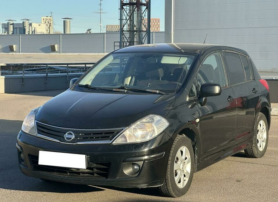 Nissan Tiida 1.6 AT (110 л.с.)