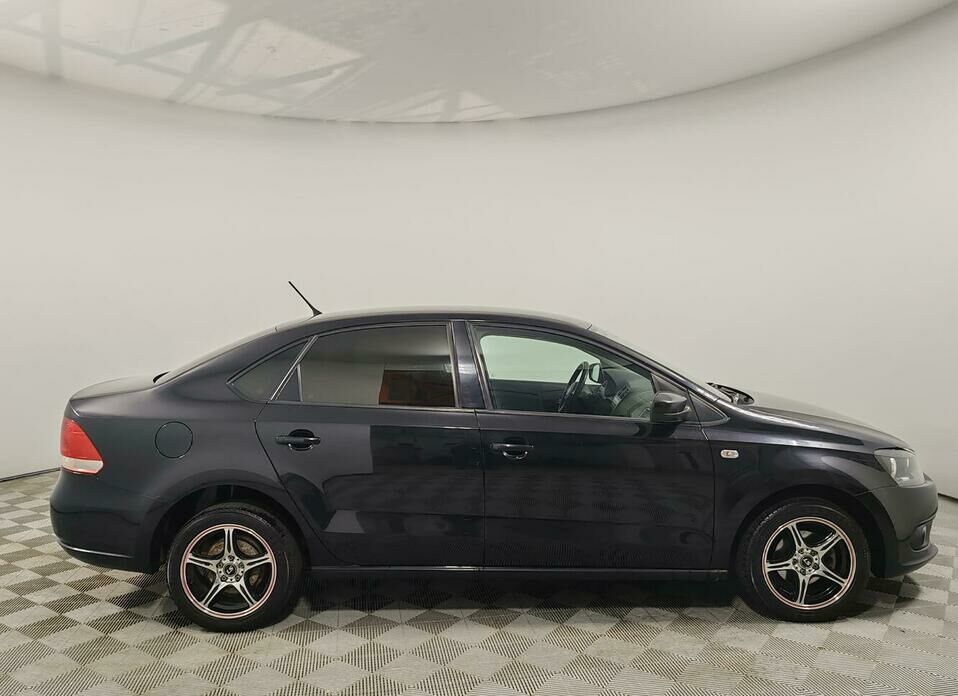 Volkswagen Polo 1.6 AT (105 л.с.)
