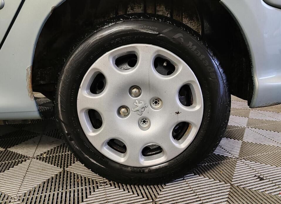 Peugeot 206 1.4 AT (75 л.с.)