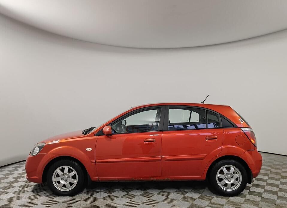 Kia Rio, II Рестайлинг 1.4 AT (95 л.с.)