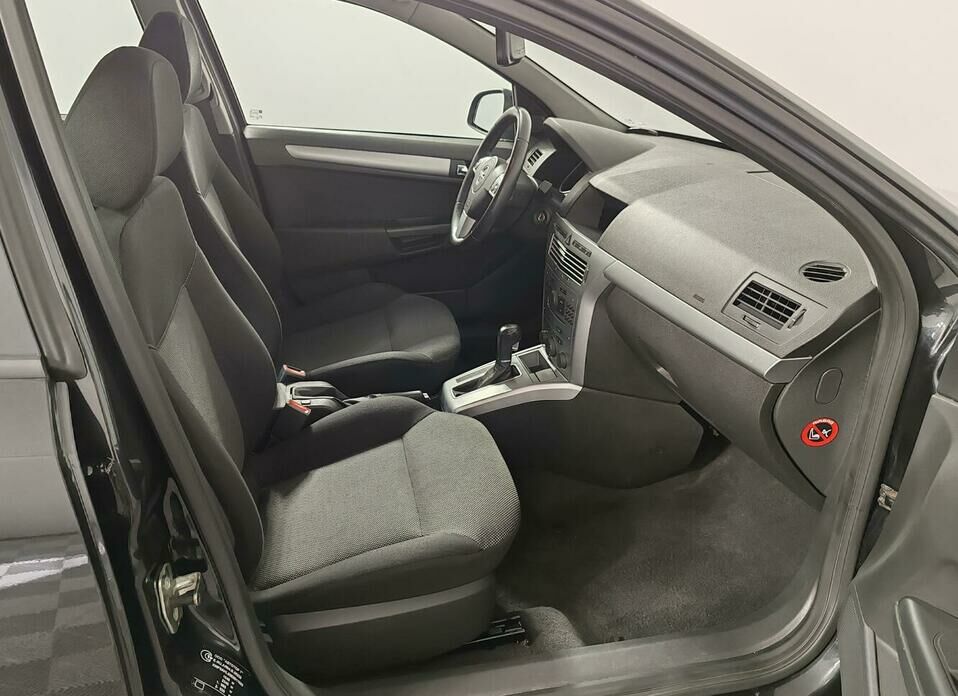 Opel Astra 1.8 AT (140 л.с.)