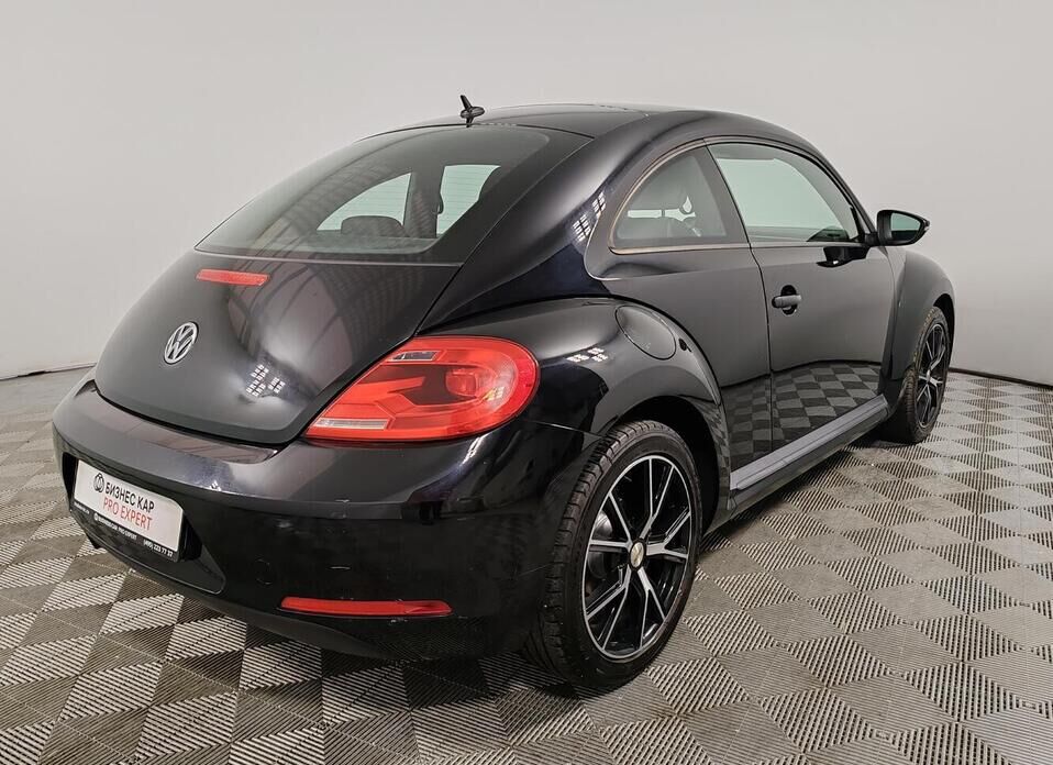Volkswagen Beetle, II (A5) 1.2 AMT (105 л.с.)