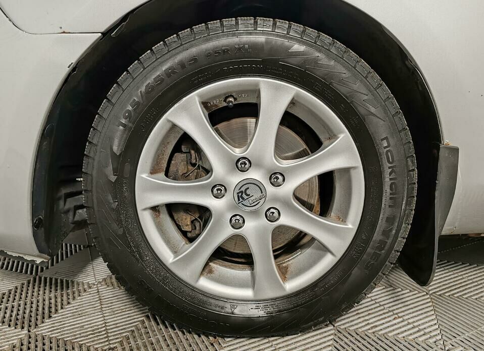 Mazda 3 1.6 AT (105 л.с.)