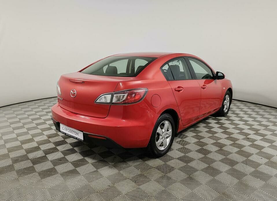 Mazda 3 1.6 AT (105 л.с.)