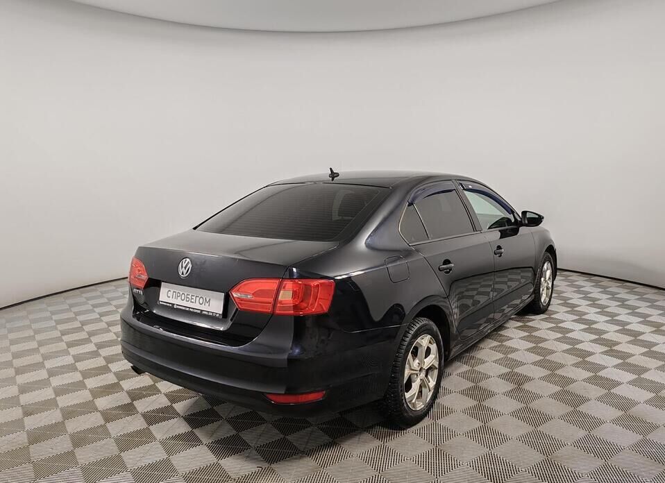 Volkswagen Jetta 1.6 AT (105 л.с.)