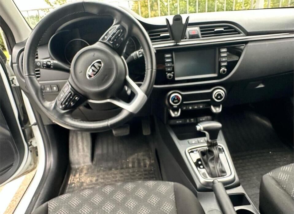 Kia Rio X-Line 1.6 AT (123 л.с.)
