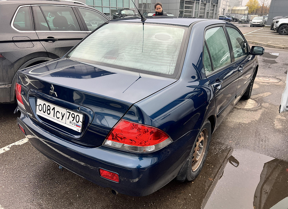 Mitsubishi Lancer, IX 1.6 AT (98 л.с.)