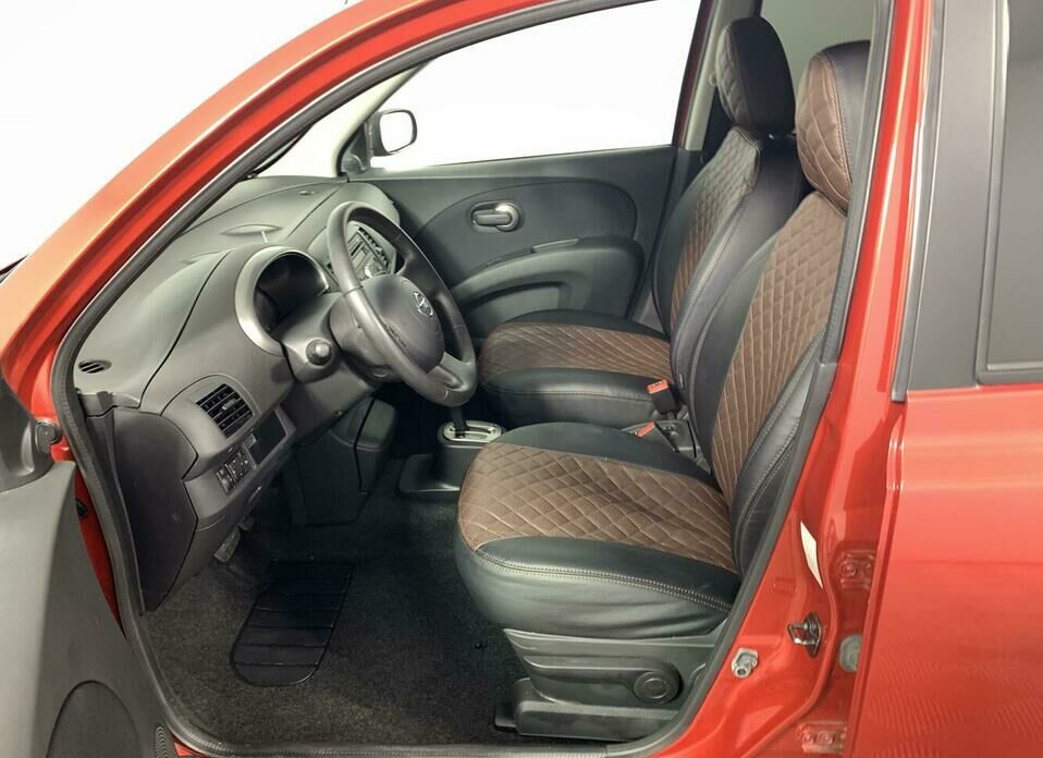 Nissan Micra 1.4 AT (88 л.с.)