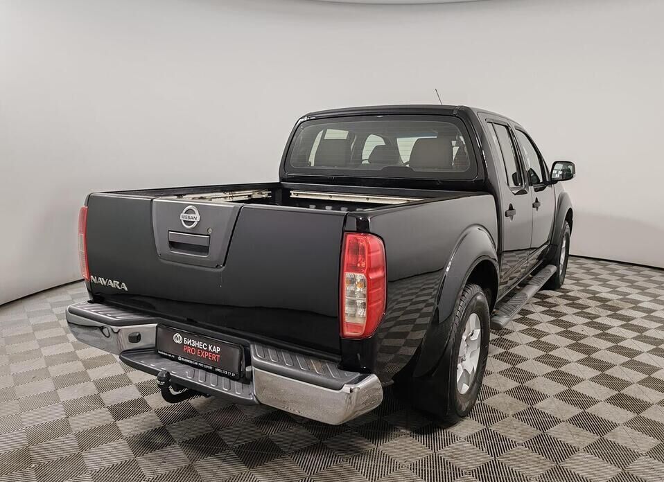 Nissan Navara (Frontier), III (D40) 2.5d AT (174 л.с.) 4WD