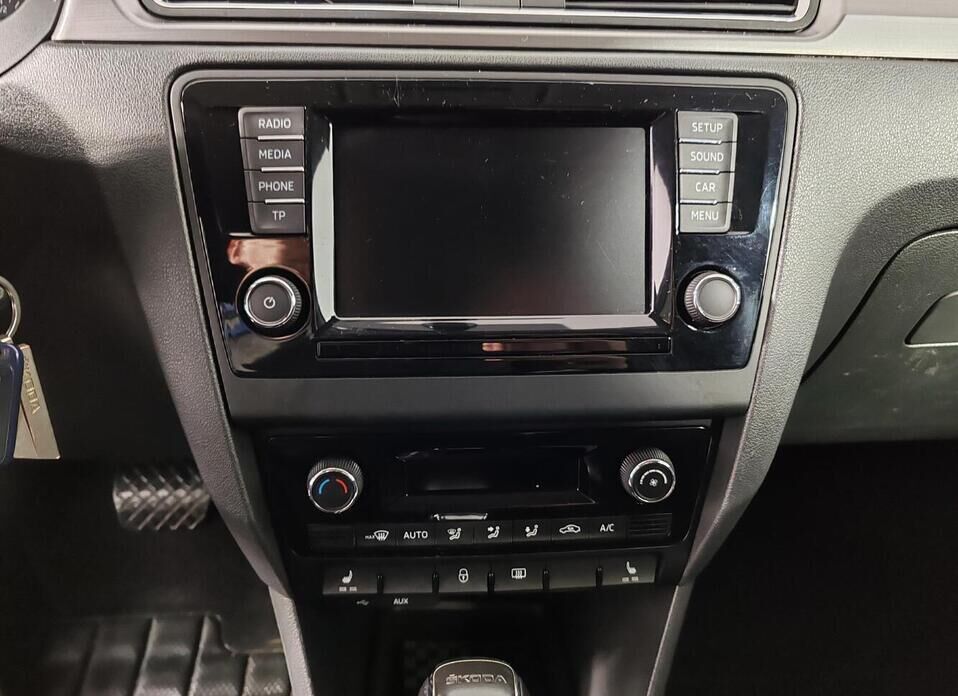 Skoda Rapid, I 1.6 AT (110 л.с.)