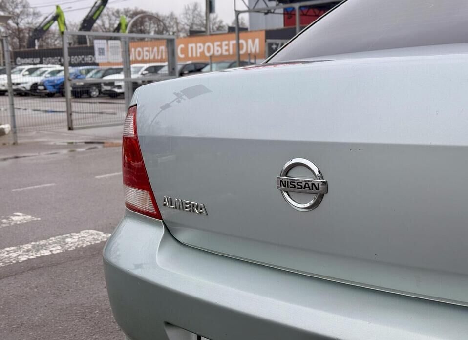 Nissan Almera Classic, I 1.6 MT (107 л.с.)