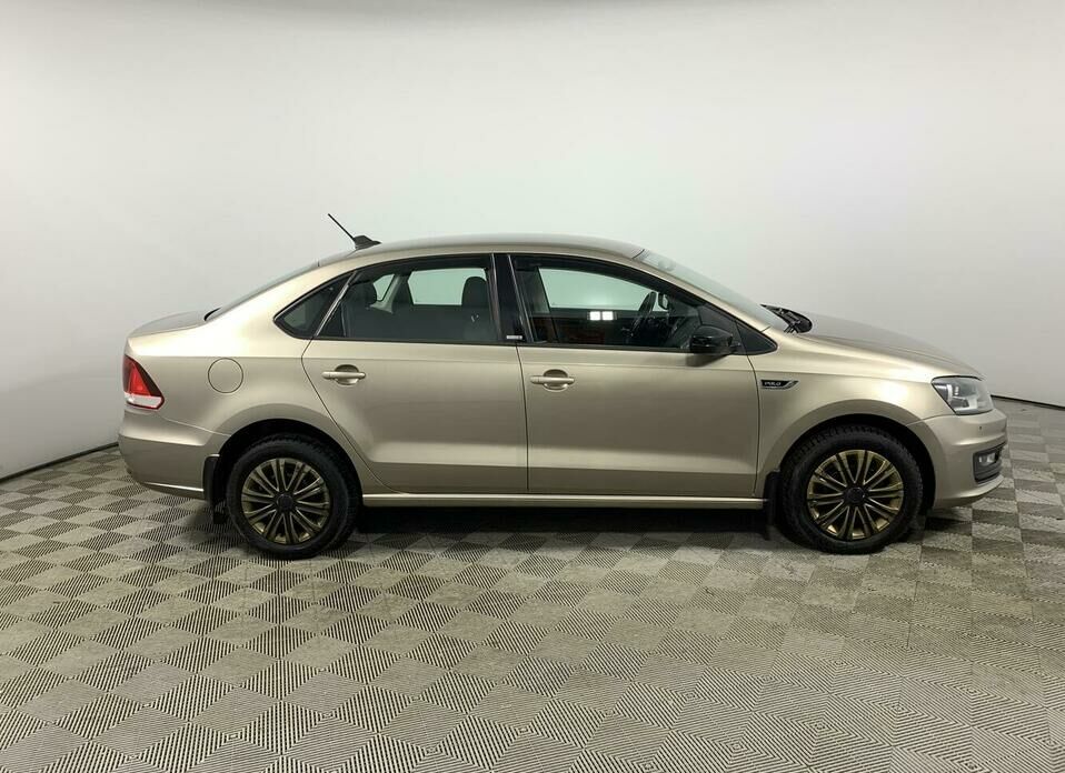 Volkswagen Polo 1.6 AT (110 л.с.)