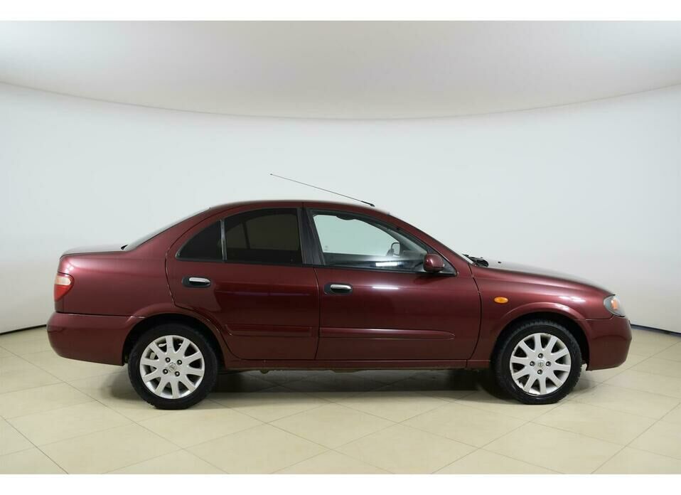 Nissan Almera 1.8 AT (116 л.с.)