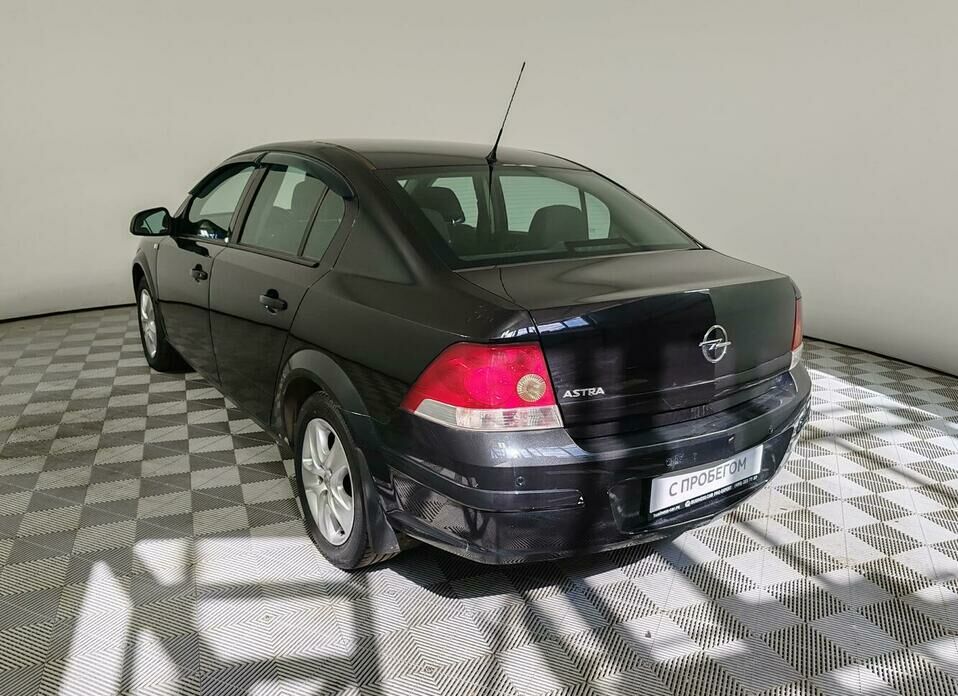 Opel Astra 1.8 AT (140 л.с.)
