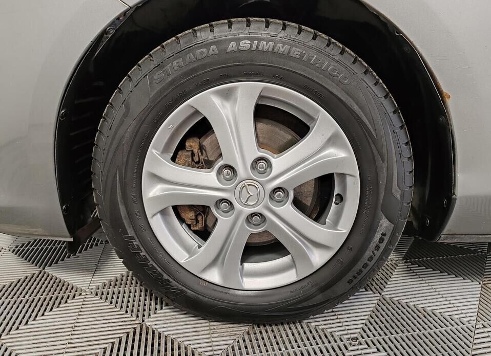 Mazda 3 1.6 AT (105 л.с.)
