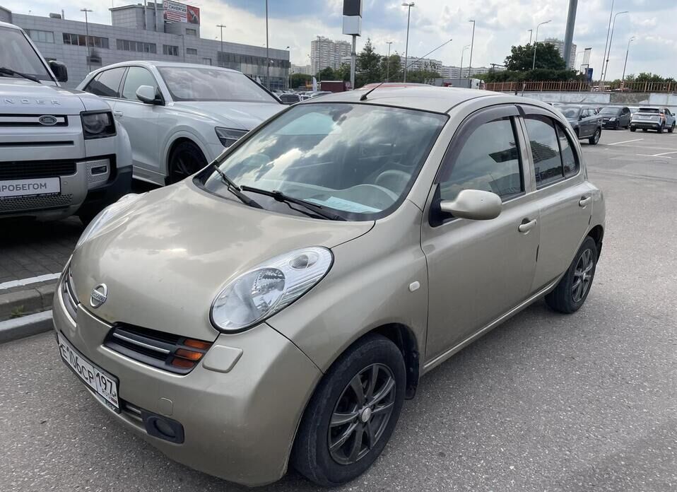 Nissan Micra 1.4 AT (88 л.с.)