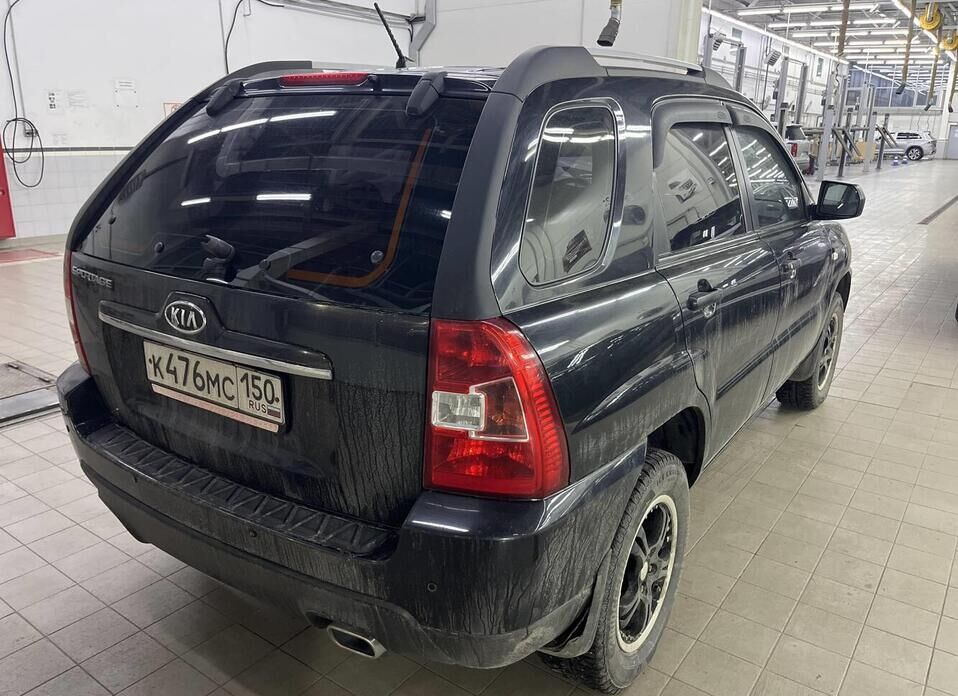 Kia Sportage, II Рестайлинг 2.0 MT (141 л.с.)