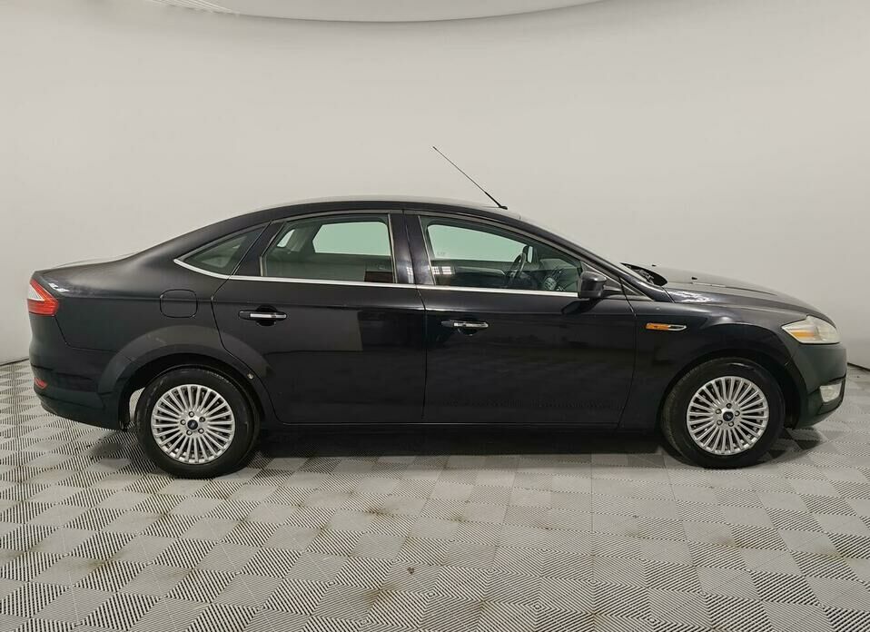 Ford Mondeo 2.0 MT (145 л.с.)
