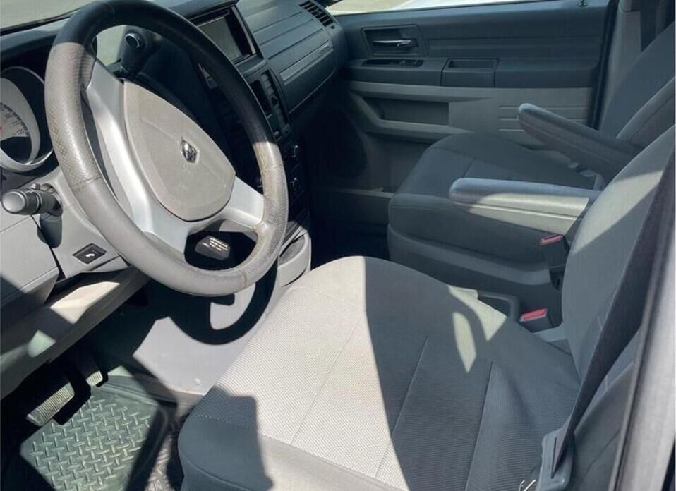 Dodge Caravan Grand 3.3 AT (173 л.с.)