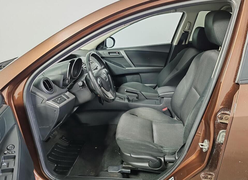 Mazda 3, II (BL) Рестайлинг 1.6 AT (105 л.с.)