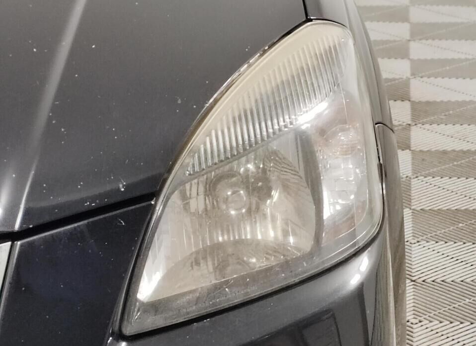 Kia Rio, II Рестайлинг 1.4 AT (95 л.с.)