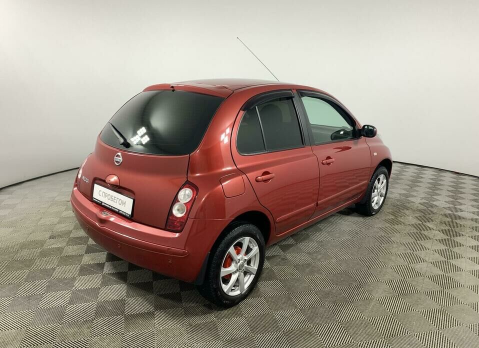 Nissan Micra 1.4 AT (88 л.с.)