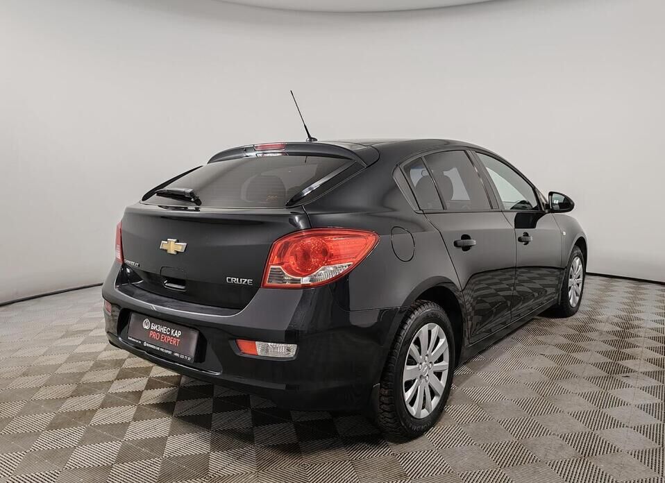 Chevrolet Cruze, I Рестайлинг 1.6 AT (109 л.с.)
