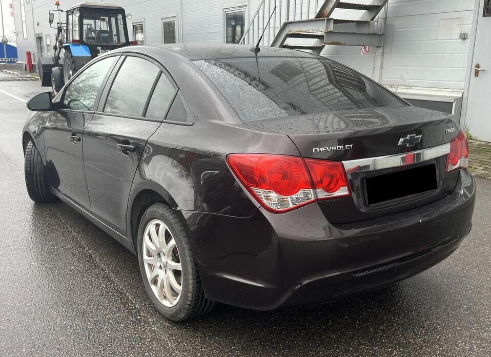 Chevrolet Cruze, I Рестайлинг 1.6 AT (109 л.с.)