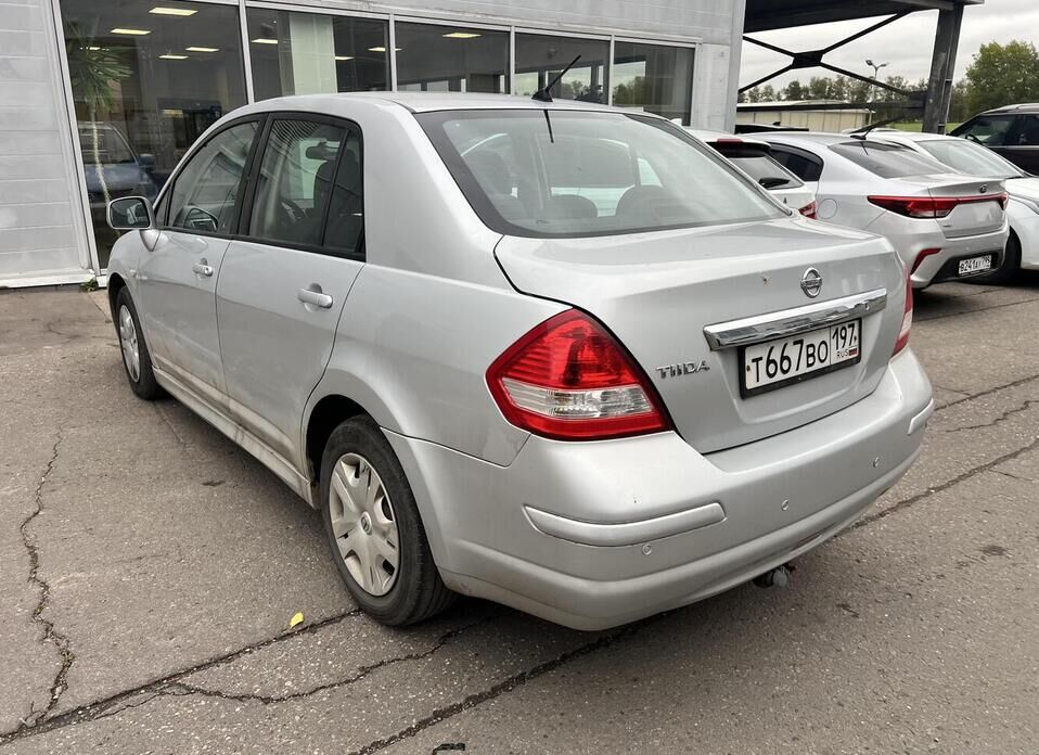 Nissan Tiida, I 1.6 MT (110 л.с.)