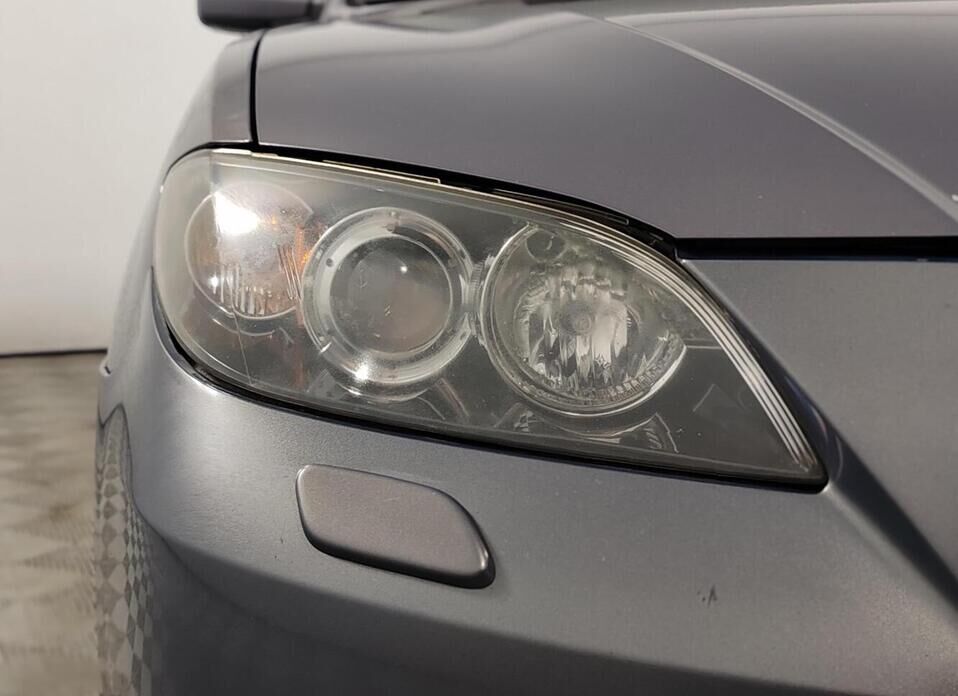 Mazda 3 1.6 AT (105 л.с.)