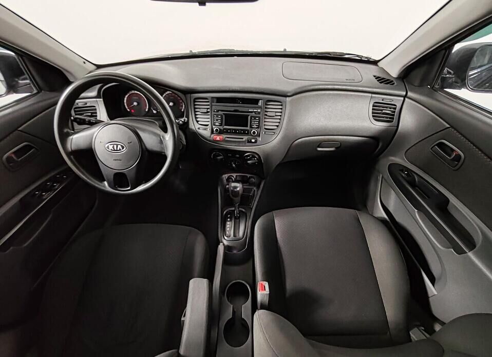 Kia Rio, II Рестайлинг 1.4 AT (95 л.с.)