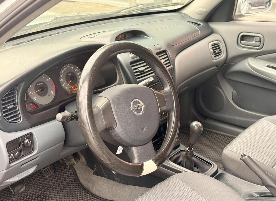 Nissan Almera Classic, I 1.6 MT (107 л.с.)