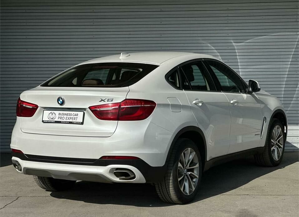BMW X6 M 4.4 AT (575 л.с.) 4WD